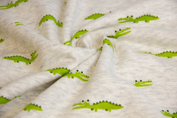 Alpenfleece mit Krokodilen, natur meliert, 0,5 m